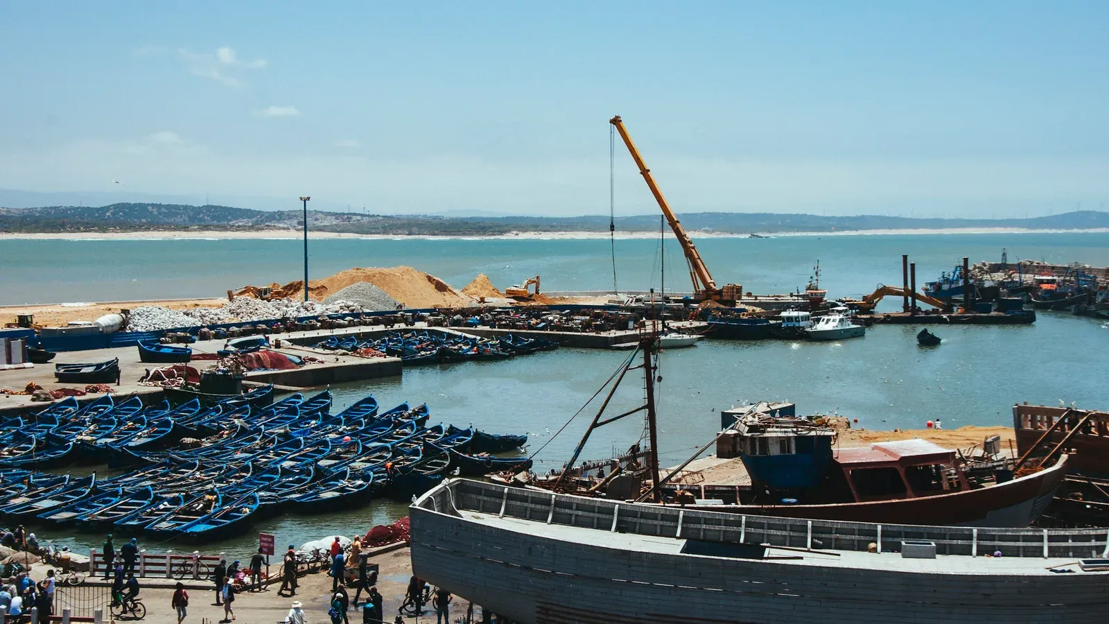 Fishing boats and the waterfront at the port of Essaouira