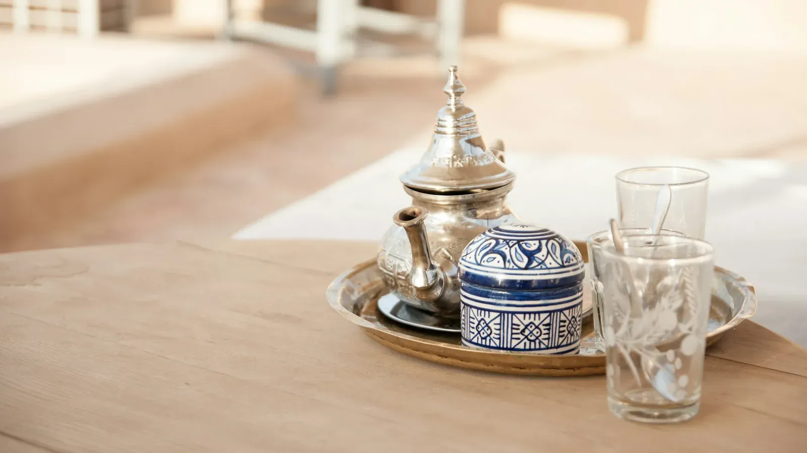 A tea tray on an outdoor table at Riad Dar Bensouda in Fes