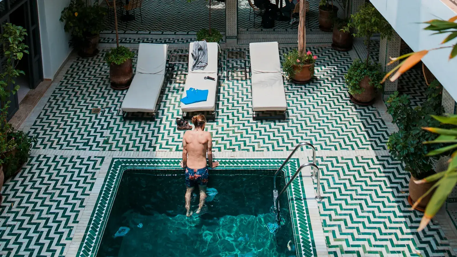 Courtyard pool and tiled floor at Rodamon Riad Marrakech, seen from above