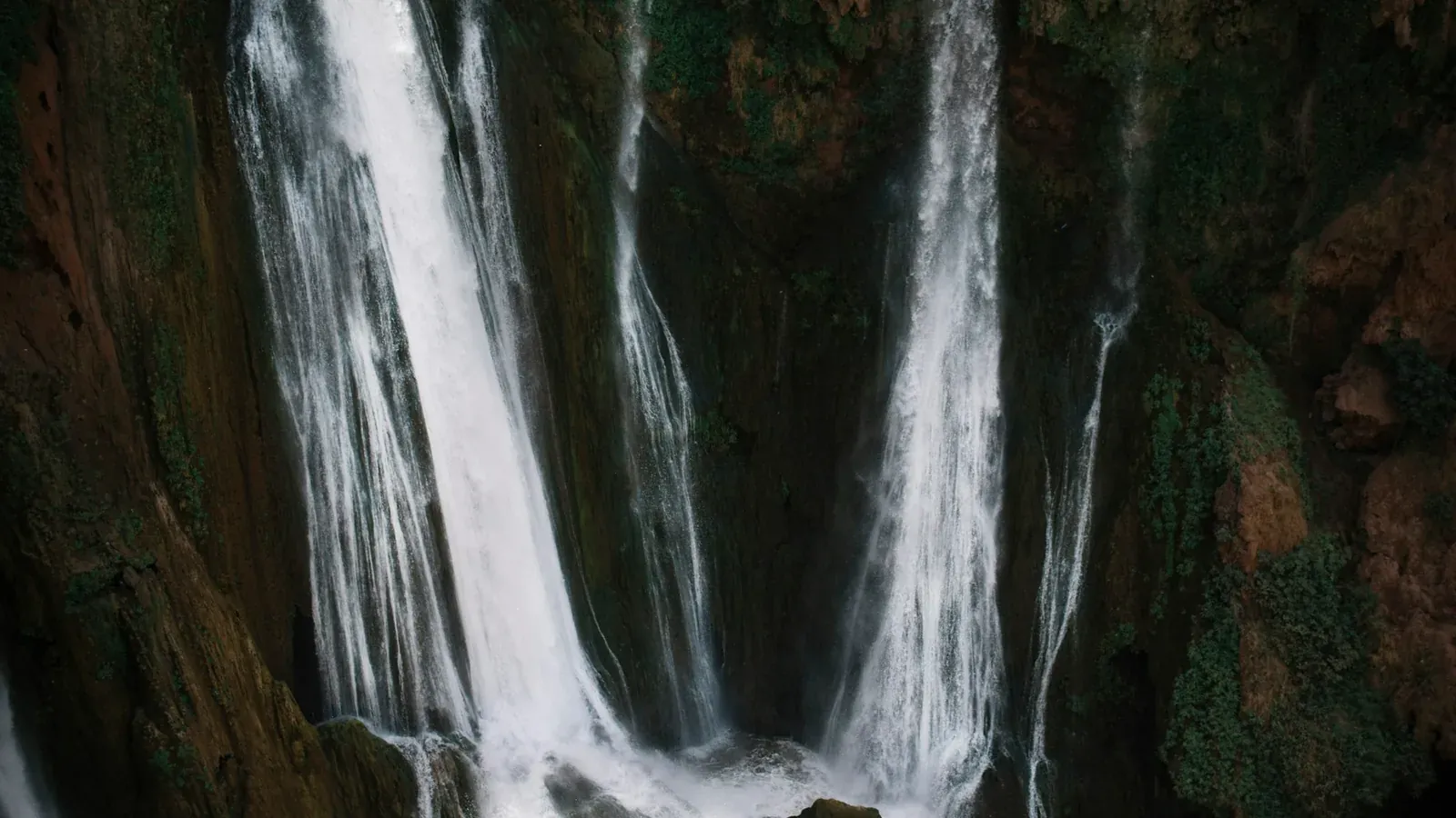 Water cascading down the rock face at Ouzoud Falls in Morocco